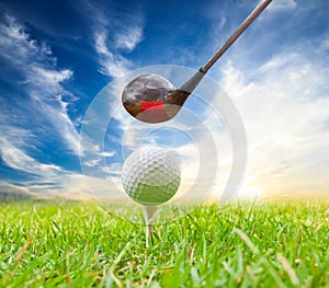 Driver hit golf ball on tee photo