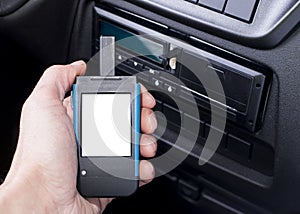 Driver holding a digital tachograph reader with  white screen. Tachograph download.