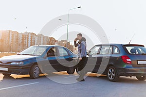 Driver making phone call after traffic accident