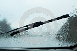 Driver POV Through Raindrop Car