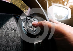 The driver presses the cruise control button