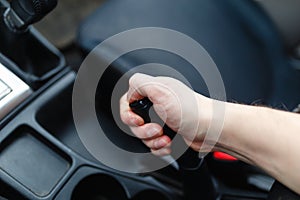 The driver pulls the hand brake lever