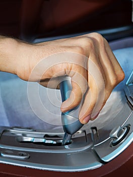 Driver's hand changing speed