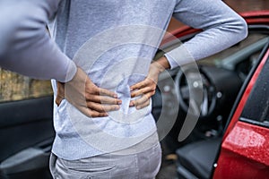 Driver Standing Having Backpain