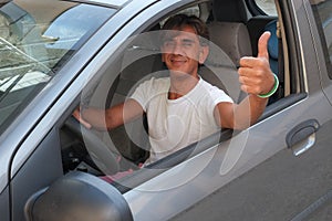 Driver with thumb up