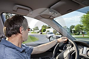 Driver turning at street corner