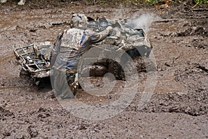 Driver and vehicle in mud