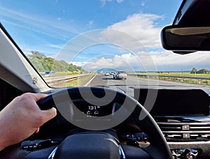 Driver view POV from car while driving a car