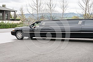 Driver waits in his limousine