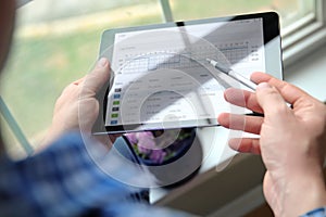 Driver writing electronic log books. ELD photo