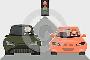 Drivers waiting at traffic light