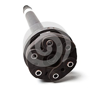 Driveshaft with cardan joint from a car on white isolated background. Used spare parts from junkyard catalog