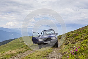 Driving a 4x4 car on a mountain road