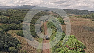 Driving in Aberdare National Park, Kenya, Africa. Aerial drone view fo