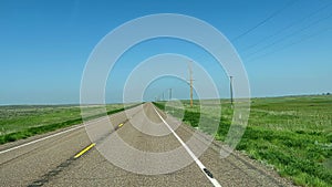 Driving through the agricultural area along Highway 2 in Montana