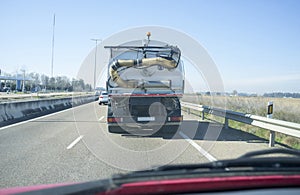 Driving behind slow tanker truck at local road