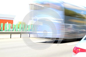 Driving bus in city traffic in motion blur. blur background wit