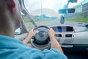 Driving a car - back seat view