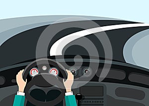 Driving car concept - hands on steering wheel with curved asphalt road