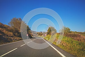 Driving a car on a highway. View from the windscreen