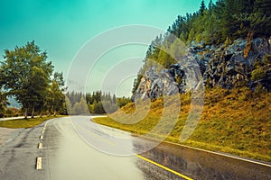 Driving a car on the mountain road