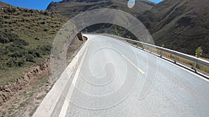 Driving car on mountain trail in tibet