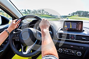 Driving a car with navigation photo