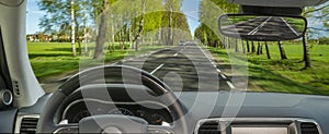 Driving car, steering wheel, travel background
