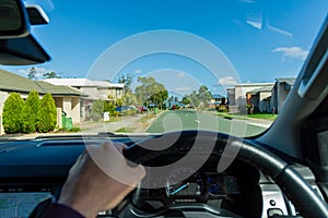 Driving a Car through the Suburbs of Australia