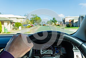 Driving a Car through the Suburbs of Australia