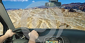 Driving a car towards Zabriskie Point, Death Valley, California, USA