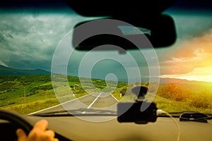 Driving a car in Tuscany valley Valdorcia