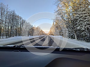 driving a car on a winter road in Russia first person view.