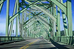 Driving on the Conde B. McCullough Memorial Bridge, Oregon, formerly the Coos Bay Bridge, on a sunny day