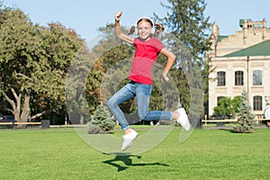 Driving dancer excellence. Little dancer perform leap on green grass. Cute girl dancer dancing energetic dance. Adorable