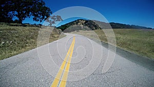 Driving down country rural road POV