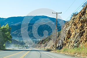 Driving down foggy highway in Malibu Creek State Park