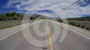 Driving down Rural Country Road Wide Angle