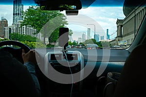 Driving through downtown Chicago in a taxi