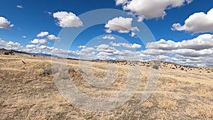 Driving dry arid desert grass sand hills POV 4K