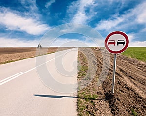 Driving on an empty asphalt road at sunny day