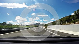 Driving on an empty highway south of Greece,