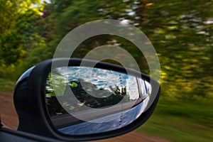 Driving through the forest by car