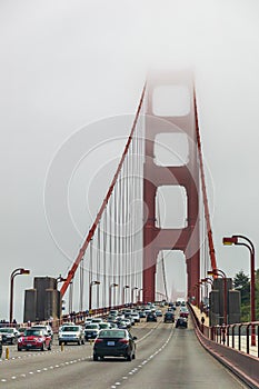 Driving on the Golden Gate bridge in the fog , San Francisco