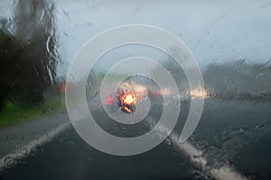 Driving with heavy rain on car windscreen - State Highway 1, Auckland, New Zealand, NZ