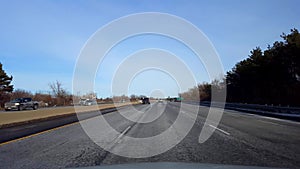 Driving Highway in Daytime. Driver Point of View POV of Interstate or Motorway or Expressway or Freeway