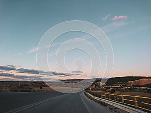 Driving highway mountain road in Greece at sunset