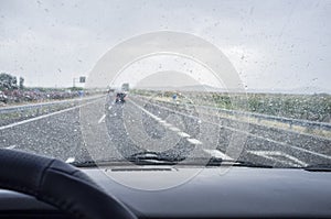 Driving on a highway in the rain