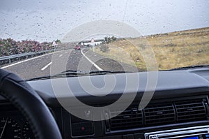Driving on a highway in the rain
