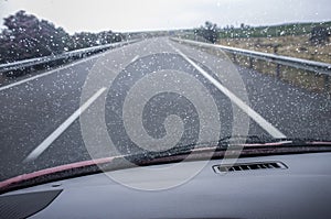 Driving on a highway in the rain